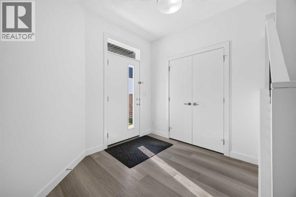 Den - 22 Copperhead Bay Se, Calgary, AB T2Z5H2 Photo 4