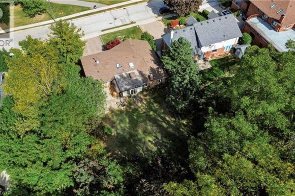 Aerial view of the backyard and surrounding wooded area of 22 Oakridge Drive. - 22 Oakridge Drive, Stoney Creek