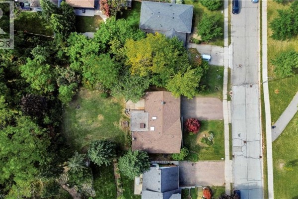 Overhead view of the property at 22 Oakridge Drive, showing the backyard and street. - 22 Oakridge Drive, Stoney Creek