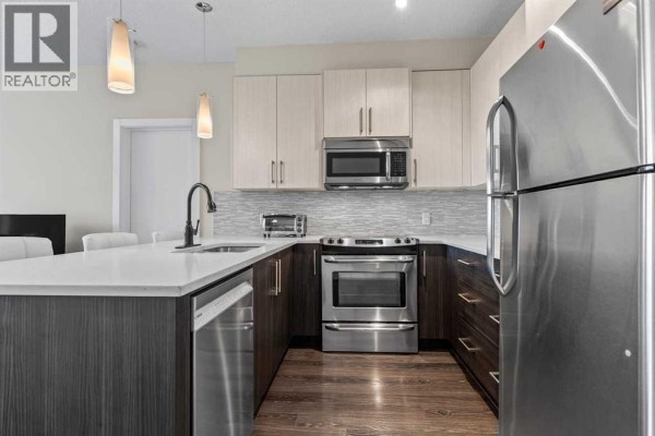 Kitchen - 220, 8 Sage Hill Terrace Nw, Calgary, AB T3R0W5 Photo 5