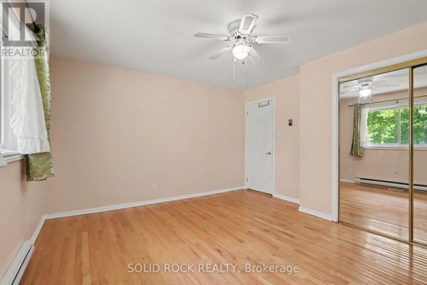 Bathroom with tub, shower, toilet, vanity, grab bars - 220 Highfield Crescent Beckwith