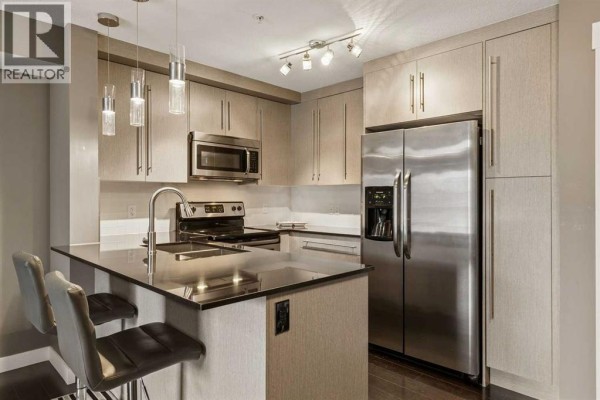 Living room - 2201, 11 Mahogany Row Se, Calgary, AB T3M2L6 Photo 3