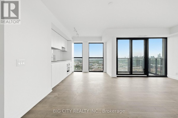 Living room - 2202 - 25 Frederick Todd Way, Toronto, ON M4G4E8 Photo 3