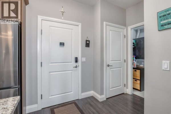 Kitchen - 2203, 15 Sunset Square, Cochrane, AB T4C0E7 Photo 4