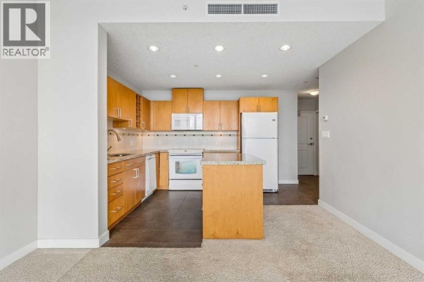 Living room - 2204, 77 Spruce Place Sw, Calgary, AB T3C3X6 Photo 5