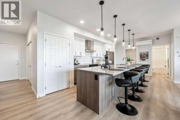 Laundry room - 2205, 550 Belmont Street Sw, Calgary, AB T2X6A5 Photo 5