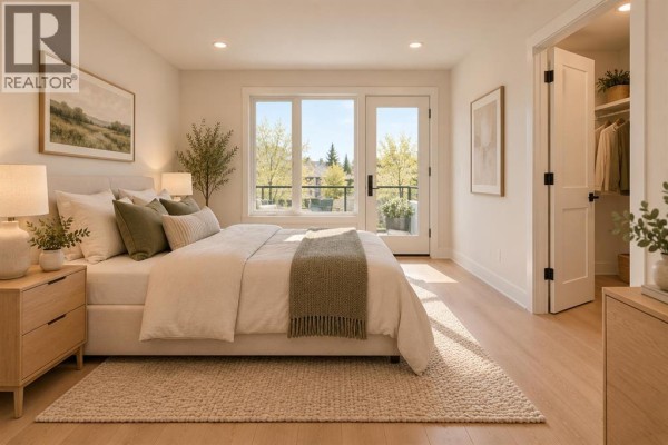 Bedroom with king-size bed, wooden nightstands, glass doors leading to a balcony, and closet. - 2205 1 Street Ne, Calgary