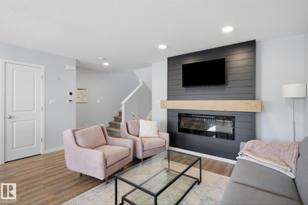 Family room - 2205 82 St Sw Sw, Edmonton, AB T6X2J6 Photo 4
