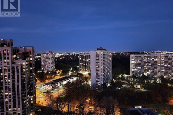 Night view of Toronto skyline from apartment building with city lights. - 2207 - 181 Wynford Drive, Toronto