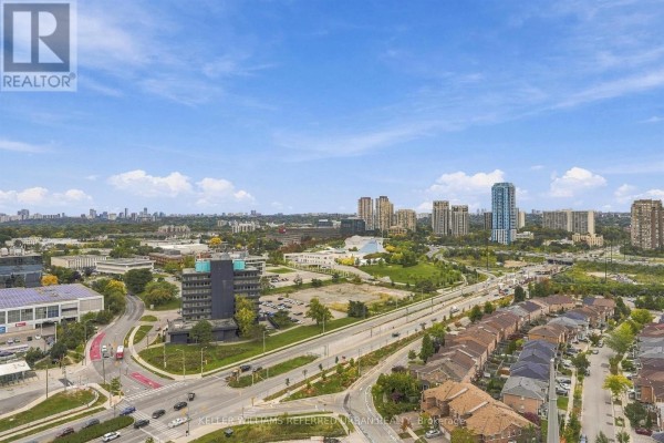 Panoramic view of a city skyline with buildings, roads, and green spaces. - 2207 - 6 Sonic Way, Toronto