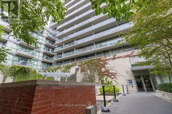 Exterior view of 775 King Street West building, a high-rise with balconies and surrounding greenery. - 221 - 775 King Street W, Toronto
