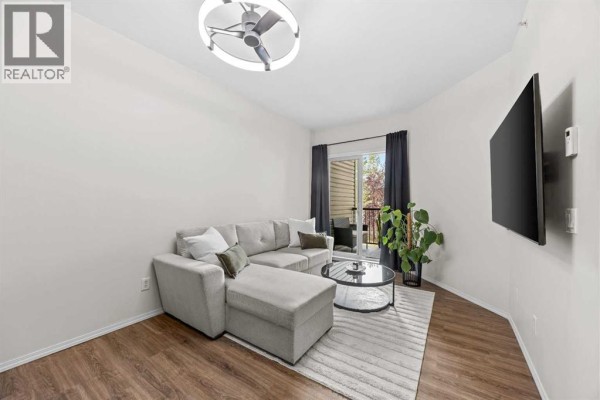 Living room - 2213, 73 Erin Woods Court, Calgary, AB T2B3V2 Photo 4