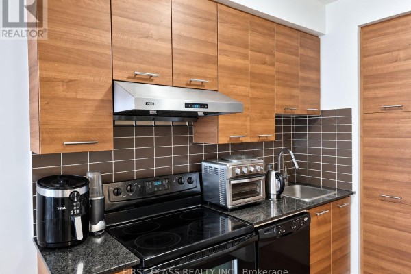 Den - 2216 - 135 Village Green Square, Toronto, ON M1S0G4 Photo 5