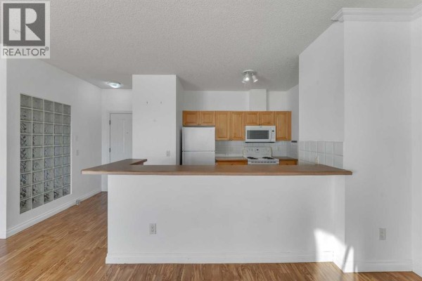 Den - 2222, 1010 Arbour Lake Road Nw, Calgary, AB T3G4Y8 Photo 4