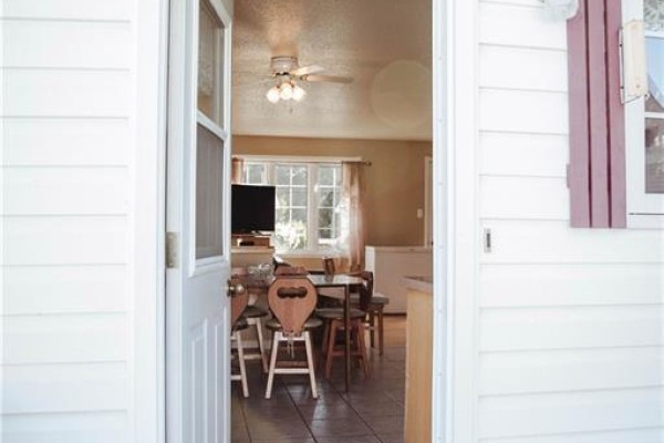View from front door into an open-concept living and dining area. - 223 Dover Street, Campbellton