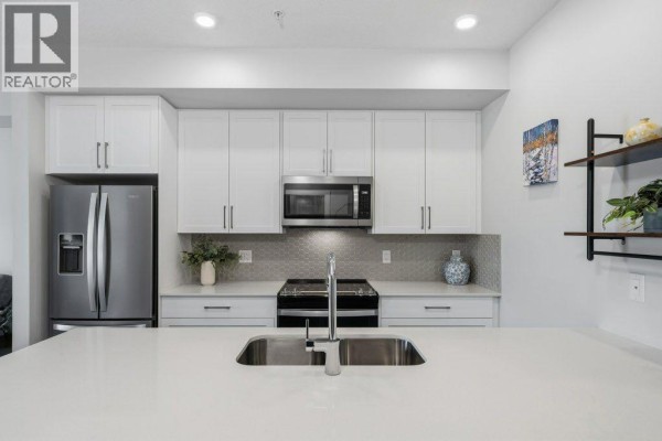 Kitchen - 224, 255 Les Jardins Park Se, Calgary, AB T2C5W9 Photo 4