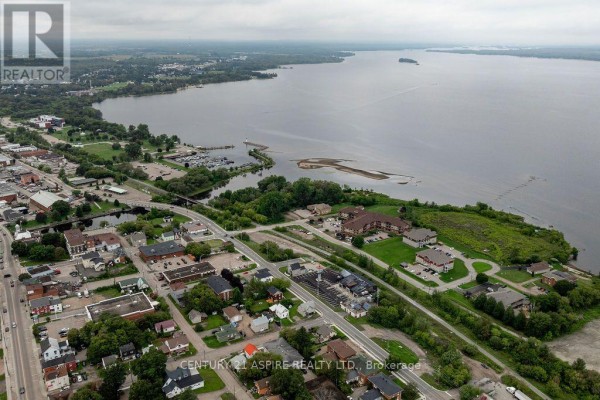 Aerial view of waterfront community with marina and lighthouse - 224 Nelson Street Pembroke