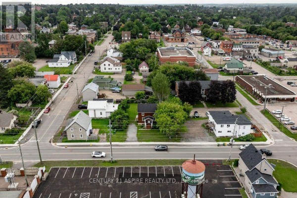 Aerial view of neighborhood with homes and water tower - 224 Nelson Street Pembroke