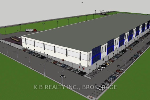 Three-quarter aerial view of the industrial building, showing its scale and proximity to a highway. - 225 Jim Kimmitt Boulevard, Greater Napanee