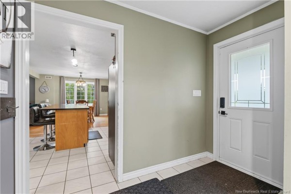 Floor plan of a finished basement with a bedroom, utility area, and storage. - 225 Quirk Road, Wards Creek