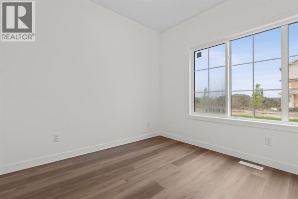 2pc Bathroom - 2252 Waterbury Road, Chestermere, AB T1X2Y9 Photo 4