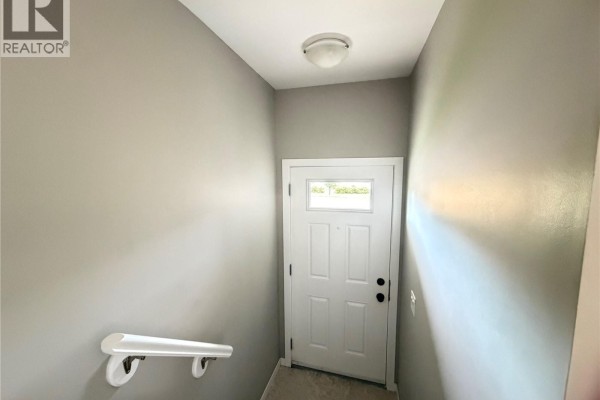 Living room - 23 4850 Harbour Landing Drive, Regina, SK S4W0K9 Photo 2