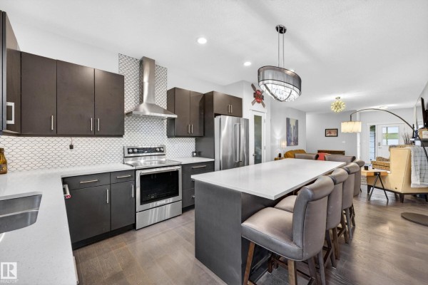 Family room - 23 Red Fox Wy, St  Albert, AB T8N7T6 Photo 4