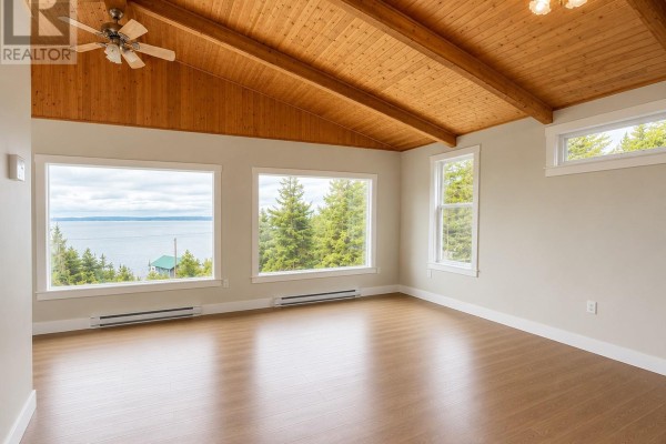 Living room/Fireplace - 231 Bacon Cove Road, Conception Harbour, NL A0A1Z0 Photo 5