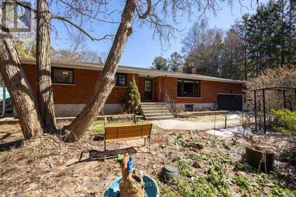 Brick ranch house with garage, steps, and tree - 2311 Division Street N Hamilton Township