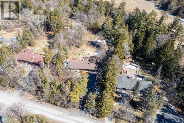 Aerial view of property with pool, hot tub, deck, and two houses - 2311 Division Street N Hamilton Township