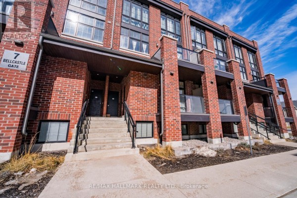 Front entrance of townhouse with stairs and landscaping - 232 - 7 Bellcastle Gate, Whitchurch Stouffville