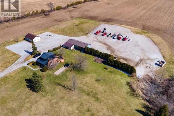 House, garage, barn, and vehicles on a rural property - 23247 Beattie Drive Elgin