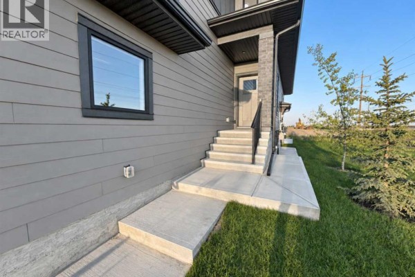 Living room - 2337 Waterbury Road, Chestermere, AB T1X3L8 Photo 3