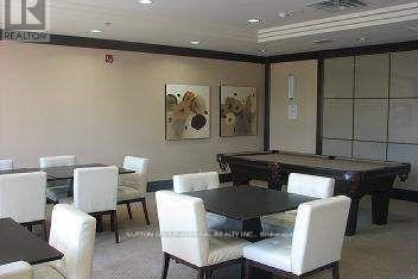 Common room with a pool table, tables, and chairs for residents. - 234 - 18 Harding Boulevard E, Richmond Hill