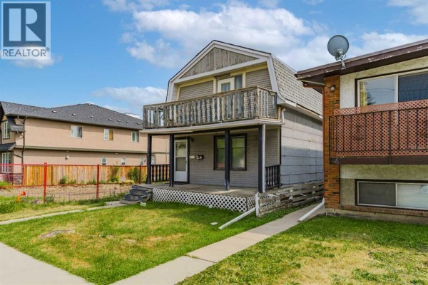 Living room - 235 20 Avenue Ne, Calgary, AB T2E1R1 Photo 2