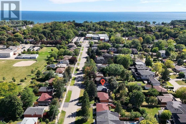 Aerial view of houses on Southview Road, Oakville, with a distant view of Lake Ontario. - 236 Southview Road, Oakville