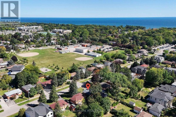 Aerial view showing houses, a school, park, and Lake Ontario in Oakville. - 236 Southview Road, Oakville