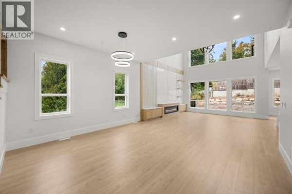 Bright open space with large windows and built-in shelving - 23685 131a Avenue, Maple Ridge