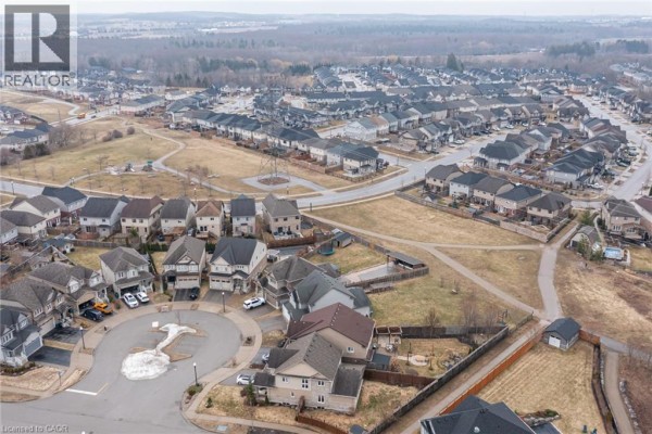 Aerial view of a cul-de-sac neighborhood with houses and walking paths - 239 Cranbrook Street Kitchener