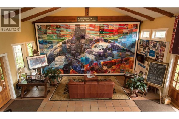 Large communal area with a massive art installation and seating. - 23b 134 Madrona Road, Galiano Island