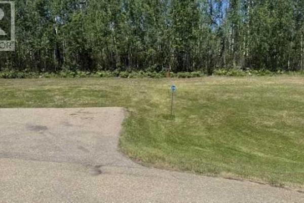 A wooden gate with a sign reading "The Properties of Eagles Quay" stands in front of trees. - 24, 2404 394 Township, Rural Lacombe County
