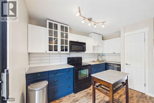 Bedroom - 24, 800 Bowcroft Place, Cochrane, AB T4C1B9 Photo 5