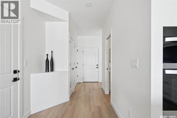 Den - 24 720 Brighton Boulevard, Saskatoon, SK S7V1X1 Photo 2