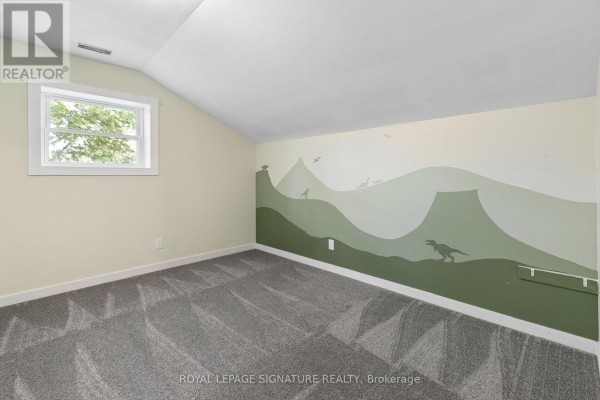 Bedroom with dinosaur mural and window - 24 Davidson Street Cambridge
