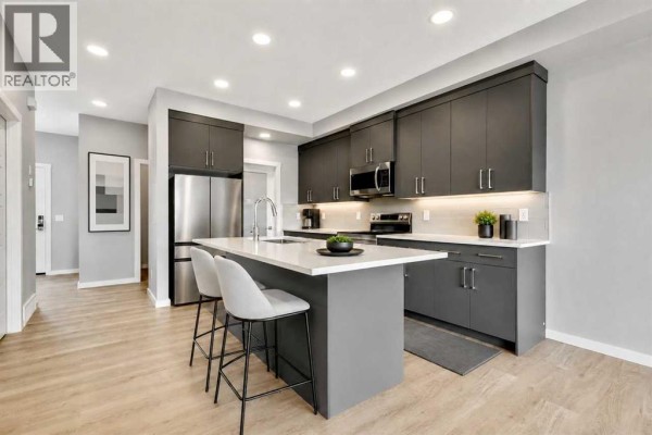 Kitchen - 24 Heritage Point, Cochrane, AB T4C2J8 Photo 2