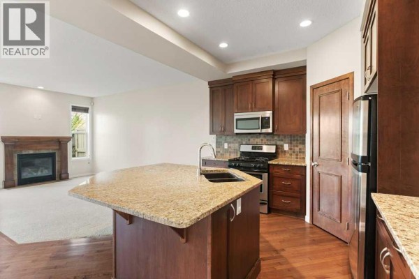 Kitchen - 24 New Brighton Landing Se, Calgary, AB T2Z0S5 Photo 4