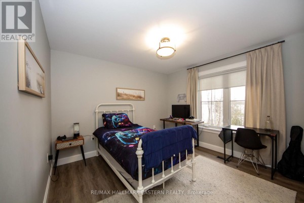 Bedroom with gaming bed, desk, and window view - 24 Rory Drive Selwyn