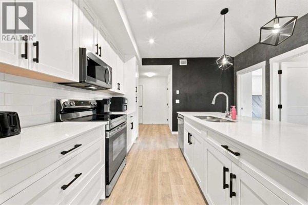 Kitchen - 2401, 200 Seton Circle Se, Calgary, AB T3M3X1 Photo 5