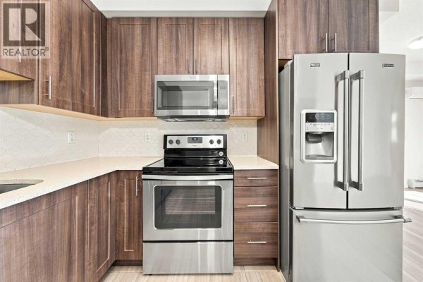 Kitchen - 2401, 215 Legacy Boulevard Se, Calgary, AB T2X3Z5 Photo 4