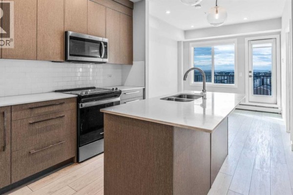 Kitchen - 2402, 395 Skyview Parkway Ne, Calgary, AB T3N2K1 Photo 4